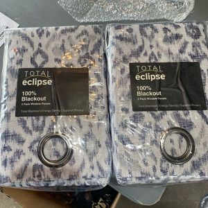 Blue and white patterned blackout curtains